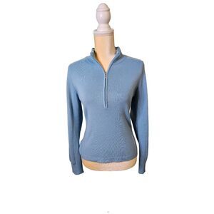 Nordica ski sweater, 3/4 zip, light blue with a white stripe down the sleeves. S